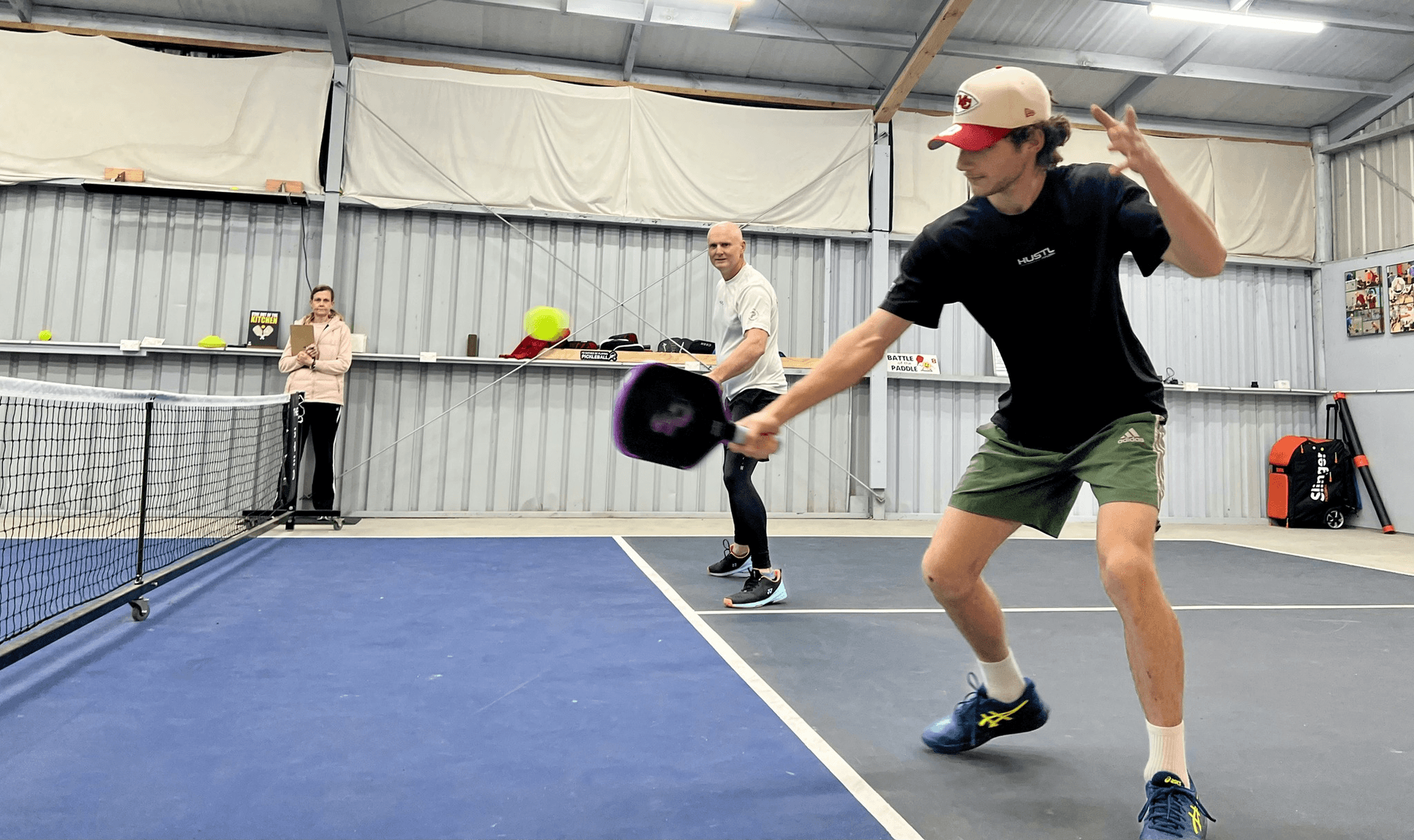 swinging in pickleball action